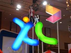 XL AXIATA (EXCL) Rugi Bersih Rp482,52 M Semester I/2014